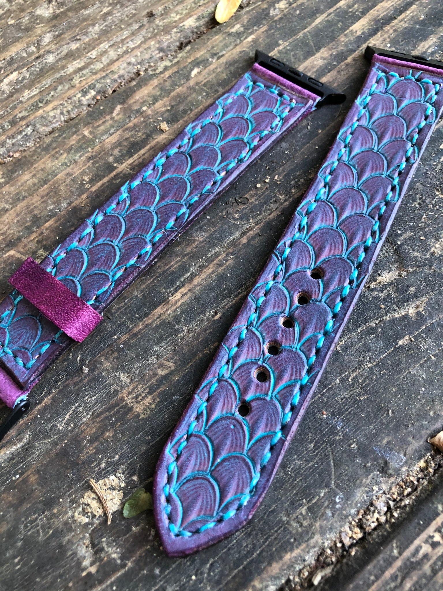 https://peyote-rose.com/cdn/shop/products/42mm-44mm-stamped-dragonscale-purple-leather-watchband_4_1024x1024@2x.jpg?v=1651457496